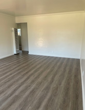 Living room with view into hall