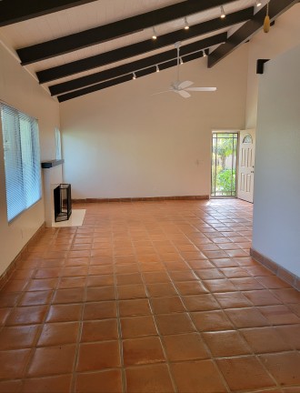 Living room and dining area from patio door